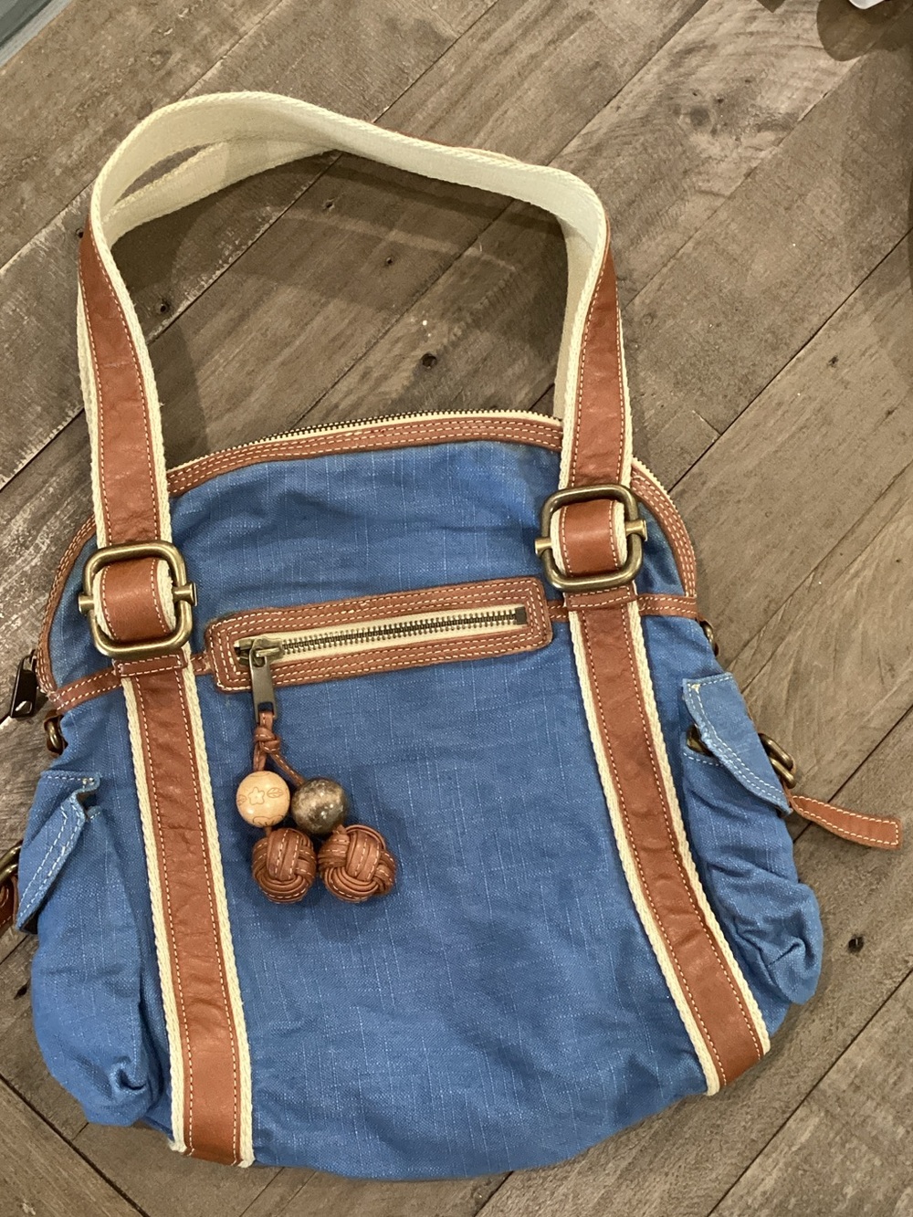 Fossil Blue Canvas Shoulder Bag with Brown Trim and Cream Strap